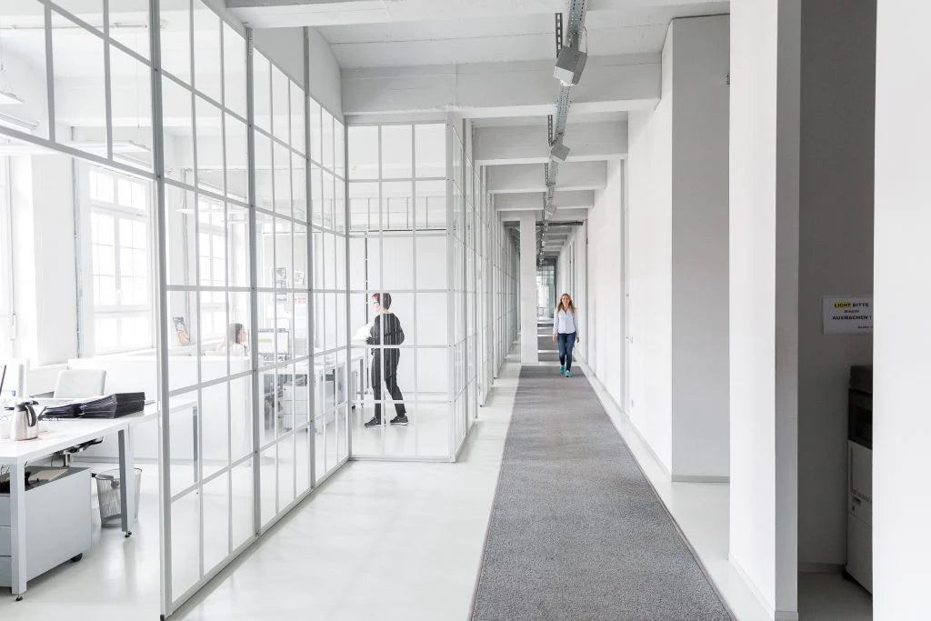 Bright office building with people